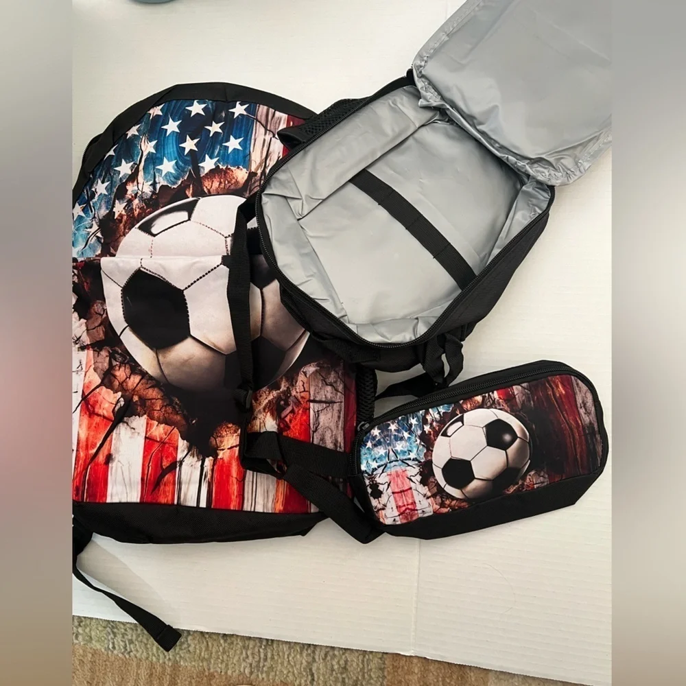 SCOROTEC BACKPACK SET (AMERICAN FLAG SOCCER) INCLUDES LUNCH BOX & PENCIL CASE.